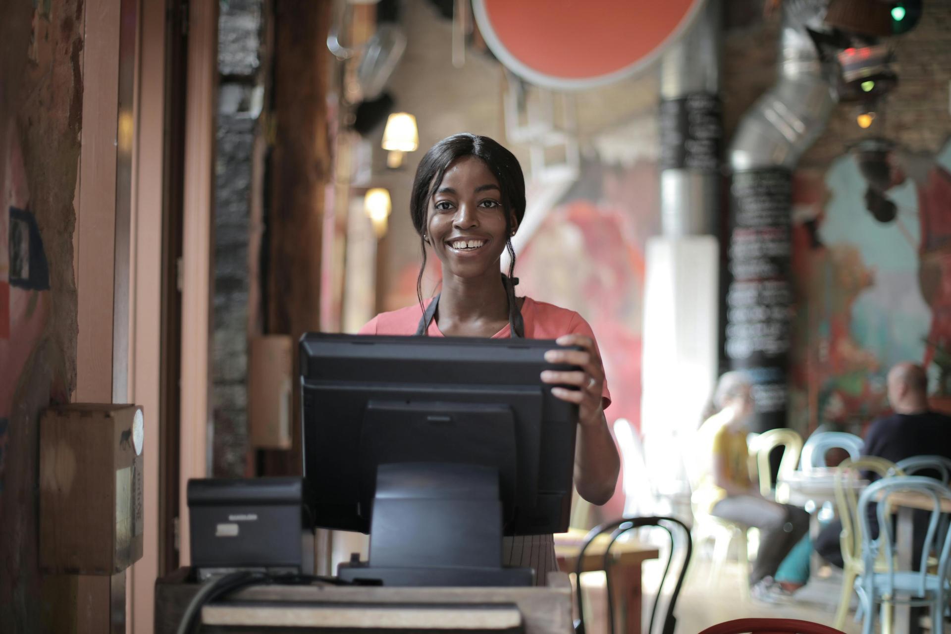 Female merchant at point of sale